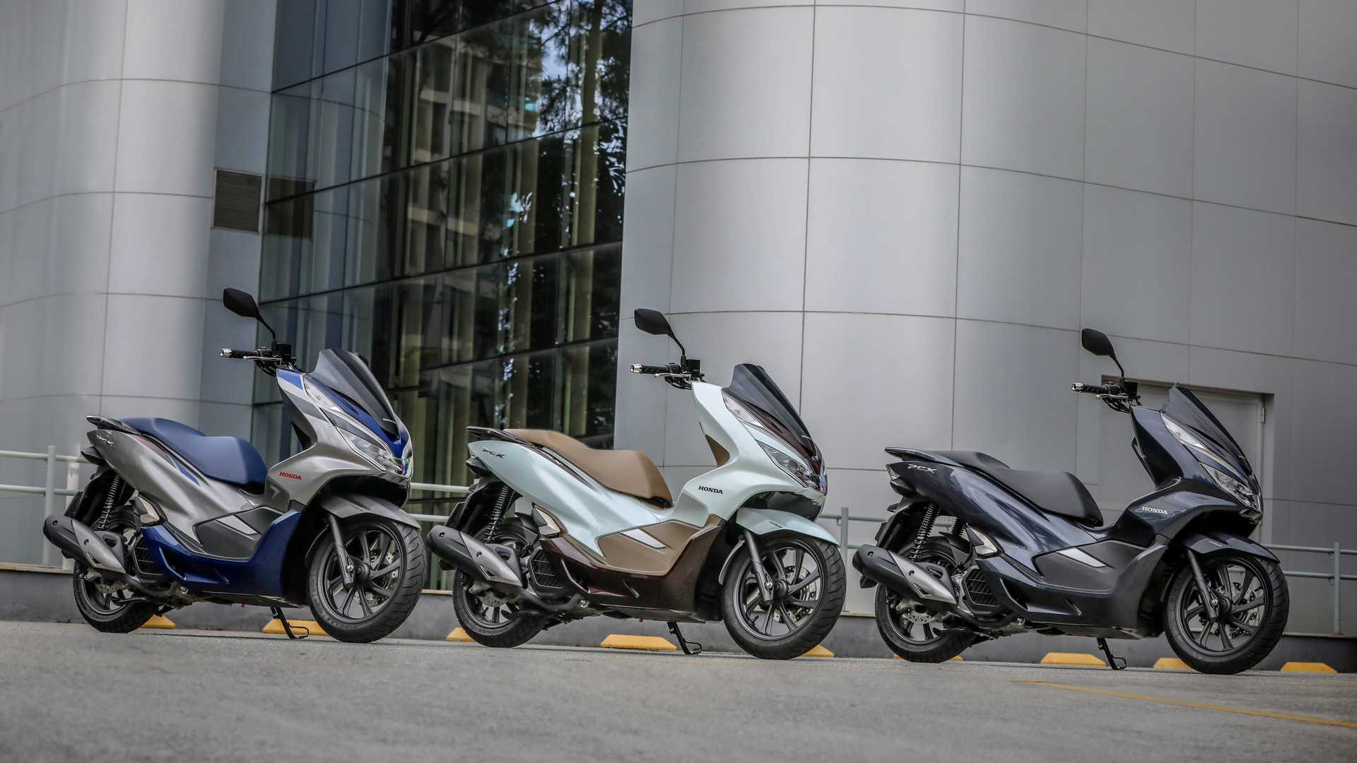 125cc scooter shootout: honda pcx v. yamaha nmax