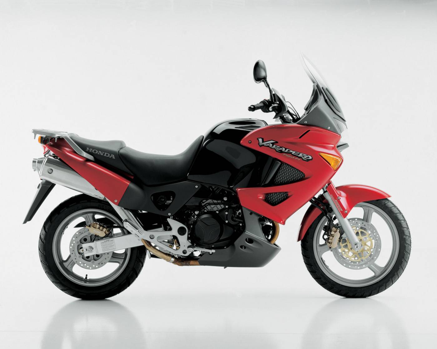 Honda xl1000v varadero: сравнительный тест-драйв с suzuki dl1000 v-strom
